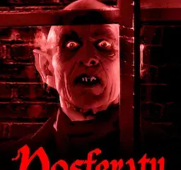 Red-tinted Nosferatu poster showing a terrifying vampire face with the title 'Nosferatu: A Symphony of Horror' below.