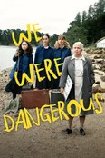 Group of people posing on a dirt path with trees in the background, yellow graffiti text reads 'WE'RE DANGEROUS' across the image.