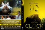 Front cover of the DVD Clock: a woman lying with a yellow background and a hanging mobile, movie title Clock and tagline 'It's counting down for a reason'.