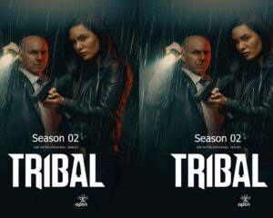 Two-person poster for 'Tribal' Season 2: a man and a woman in the rain, both holding a gun, with 'Season 02' text.
