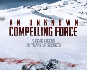 Snowy mountain poster showing a gloved hand with a camera lens in the foreground; bold red title 'AN UNKNOWN COMPELLING FORCE' and subtitle about 9 dead hikers.