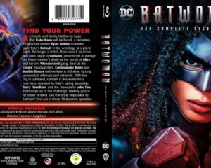 Front cover shows Batwoman in a black mask and blue-red suit with an intense gaze, city lights in the background; title Batwoman.