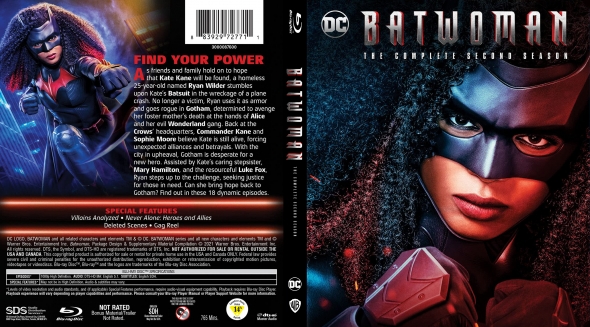 Front cover shows Batwoman in a black mask and blue-red suit with an intense gaze, city lights in the background; title Batwoman.