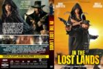 Front and back DVD cover for In the Lost Lands: front shows a hooded man with guns and a woman in the background, bold yellow title on an orange sunset backdrop; back features cast, synopsis, and credits.