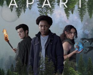 Movie poster for Worlds Apart showing three main characters in front of a forest backdrop with the title 'WORLDS APART' across the top.