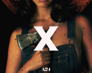 Film poster for X by A24: a young woman in denim overalls grips a bloody axe with a bold red X behind her.