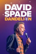Comedian David Spade performing on stage with a microphone, against a purple-orange gradient poster that reads 'DAVID SPADE DANDELION'.
