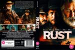 Front cover of the Rust DVD: rugged cowboys in hats with a bold 'RUST' title and desert lighting behind them.