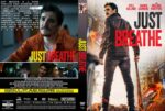 Movie poster for 'Just Breathe' featuring a man in an orange jumpsuit and a man in a leather jacket; bold red and yellow title