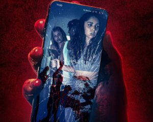 Horror poster: a cracked smartphone screen shows a terrified woman, held by a red-gloved hand against a red background with the title MAULER and the tagline 'It's too late to scream.'