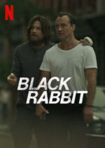 Poster for the film Black Rabbit featuring two men standing close, one with an arm around the other, with the title 'BLACK RABBIT' across the foreground.