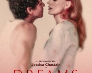 Movie poster for Dreams: a shirtless man and a red-haired woman lean toward each other as if about to kiss; bold red DREAMS title at bottom, with credits and festival logos at top.