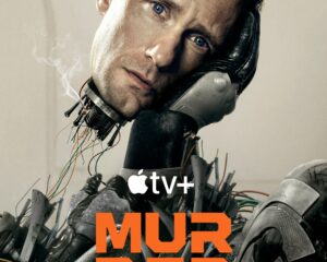 Close-up of a damaged humanoid robot with exposed wires and a gray metallic face; Apple TV+ Murder Bot poster title visible in orange text.