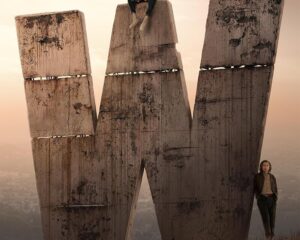Poster for Marvel's Wonder Man on Disney+, showing a giant concrete 'W' sculpture at sunset with a man sitting on the top and another man standing at the base.