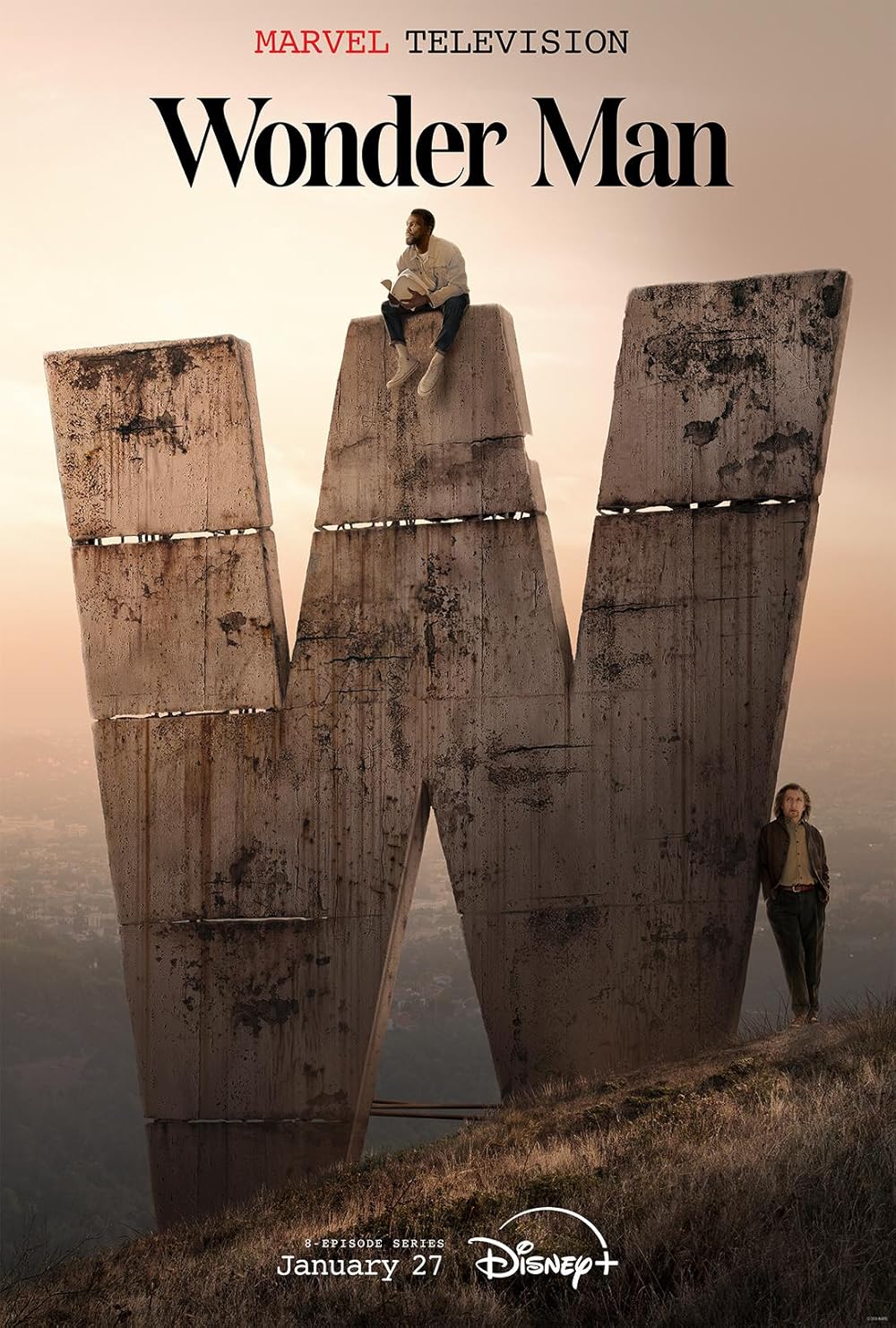 Poster for Marvel's Wonder Man on Disney+, showing a giant concrete 'W' sculpture at sunset with a man sitting on the top and another man standing at the base.