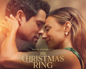Close-up of a couple embracing on a warm, golden-lit movie poster for The Christmas Ring.