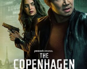 Poster for Peacock's The Copenhagen Test: a man in a leather jacket foreground with a woman aiming a pistol behind him, set against a neon-lit cityscape.