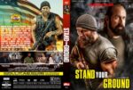 Front cover of Stand Your Ground DVD: two rugged men with rifles, bold yellow title Stand Your Ground on a dark background.