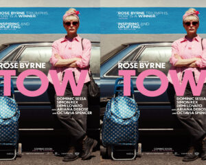 Two side-by-side promotional posters of Rose Byrne in pink, standing with arms crossed beside a blue vintage car, with large pink 'TOW' text across the bottom.